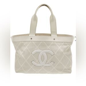 Chanel neural perforated caviar leather tote